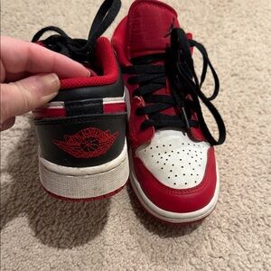 Nike Air Jordan’s Red and Black Sneakers
